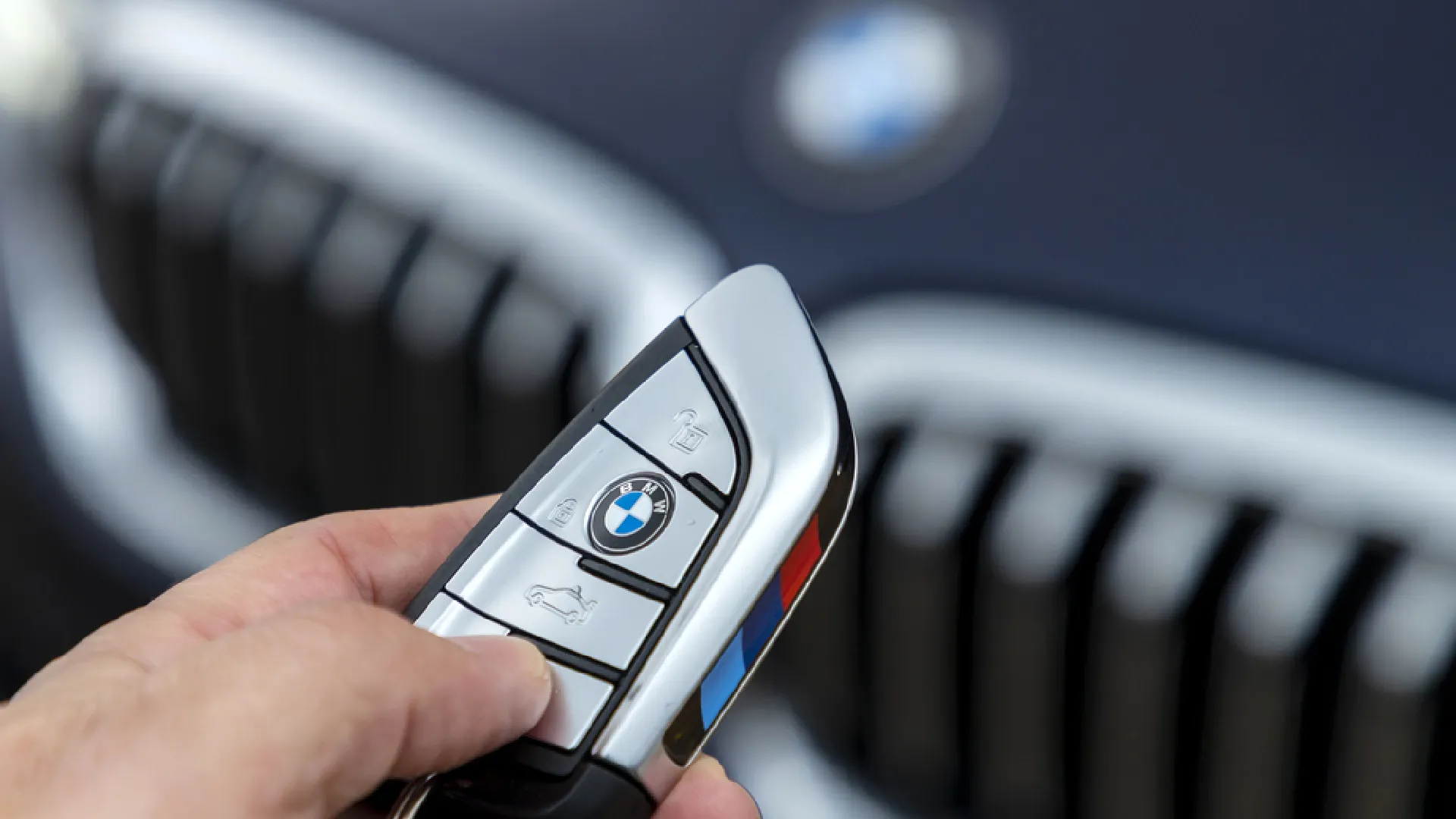 Meyer's Locksmith holding a BMW key fob