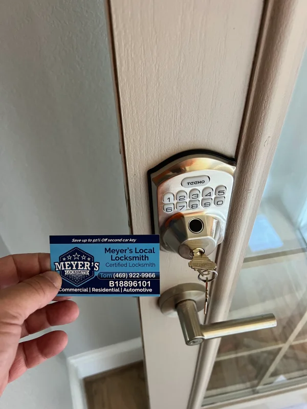 Keypad deadbolt and lever handle installed on a residential front door